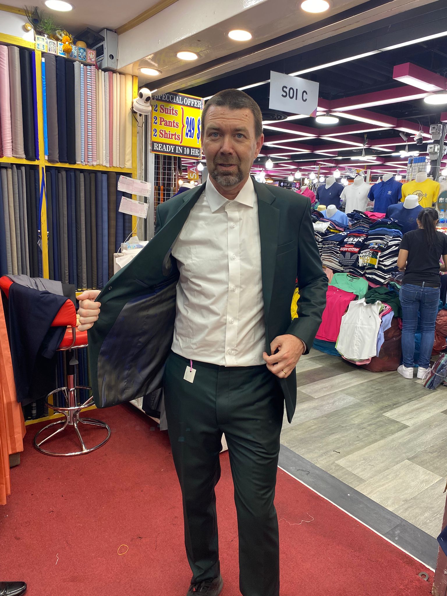 Happy client in custom tailored suit at King Fashion Uni Bangkok